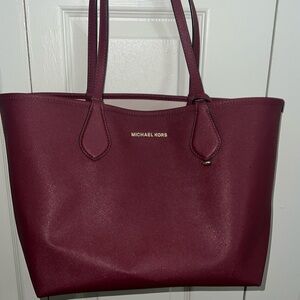Michel Kors burgundy tote bag. Wallet is included